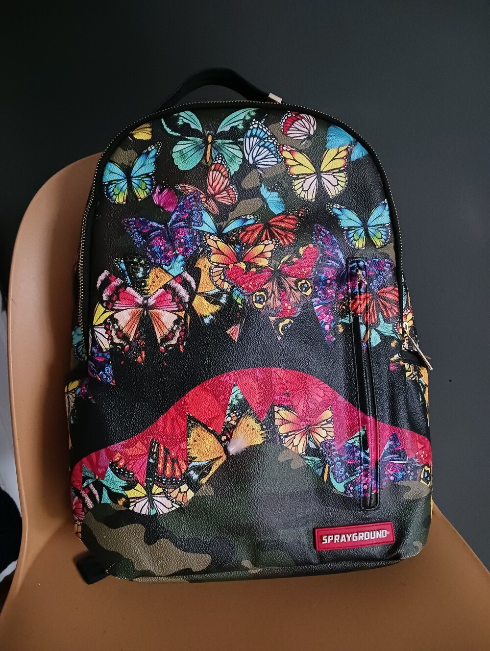 Sprayground Limited Edition Backpack with Butterfly Print and Red Wave
